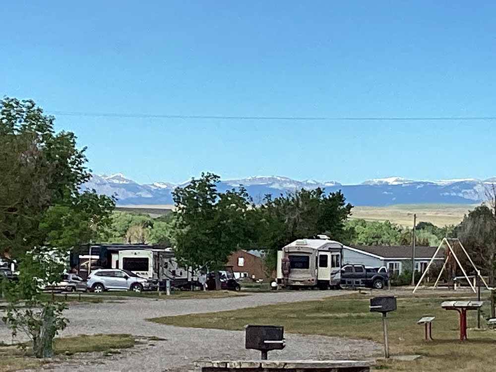 Gravel RV sites with BBQs at CHOTEAU MOUNTAIN VIEW RV CAMPGROUND