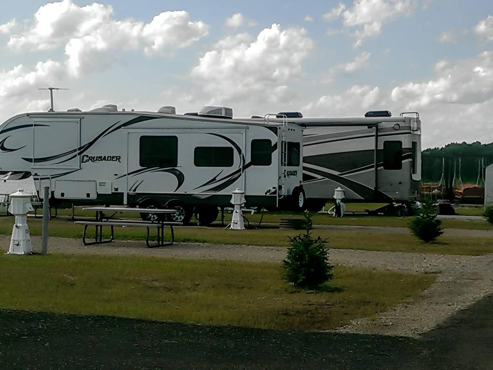 Two trailers at Harbor Cove RV Resort