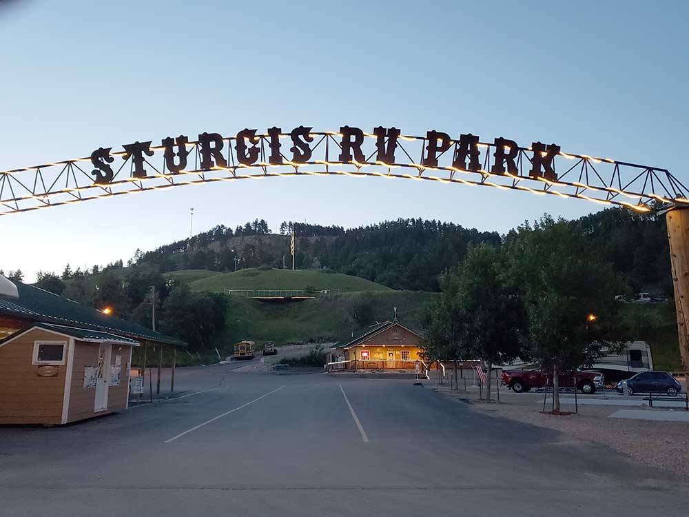 Entrance with sign over the road at STURGIS RV PARK