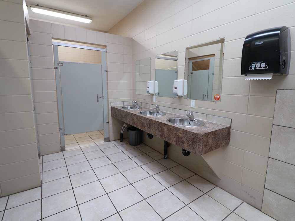 Inside of the clean bathroom at RENDEZ VOUS RV PARK & STORAGE