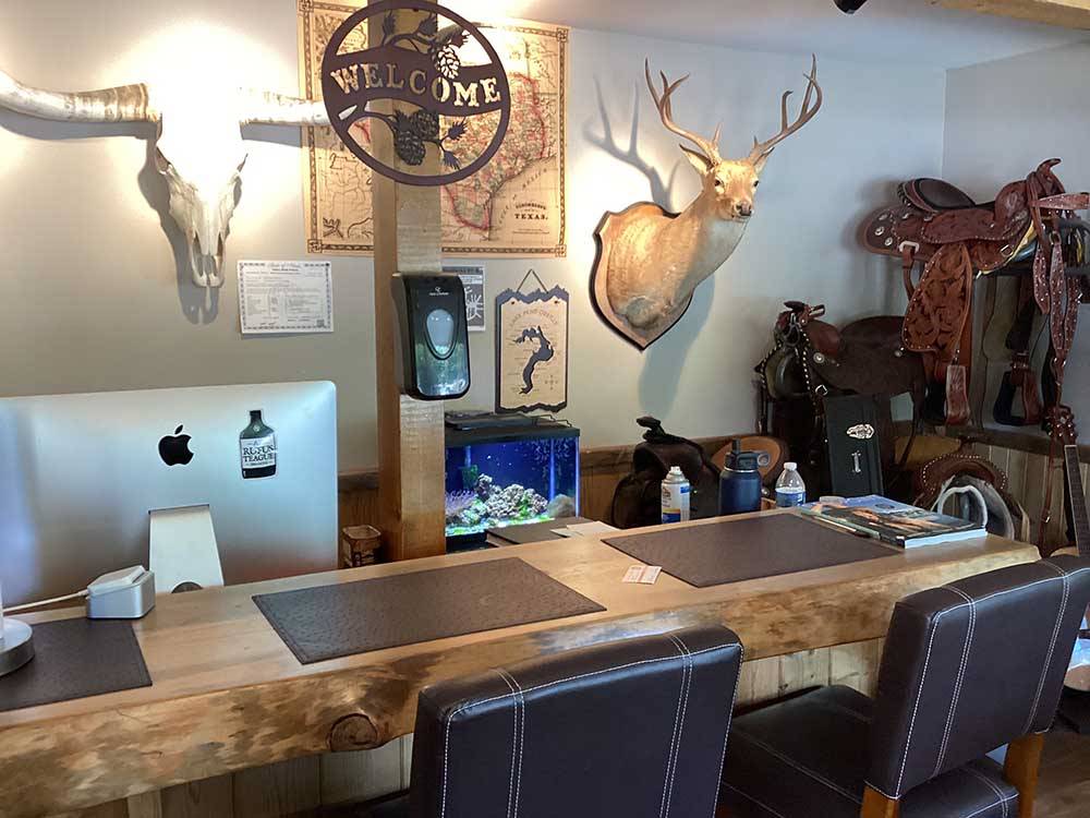 The front reception desk at THE HEMLOCKS RV AND LODGING