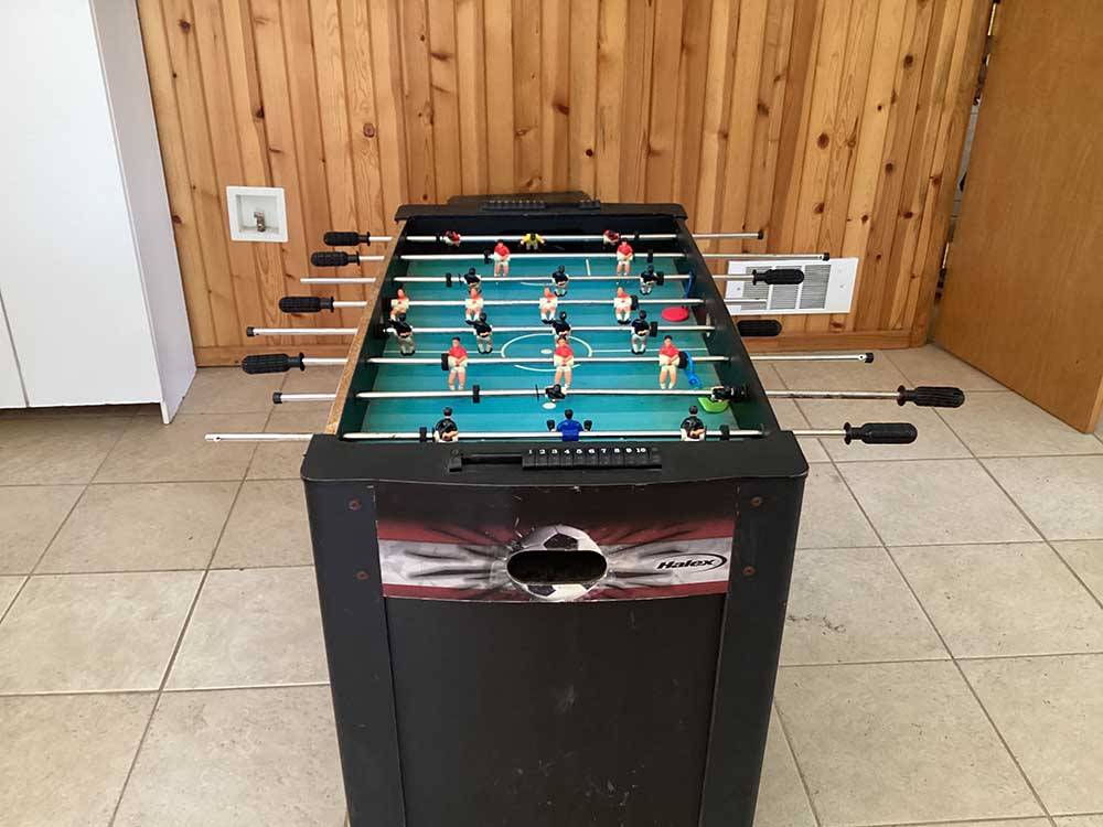 The foosball table in the rec hall at THE HEMLOCKS RV AND LODGING