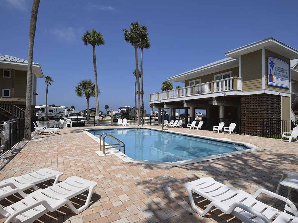 The swimming pool area at PRESNELL'S BAYSIDE MARINA & RV RESORT