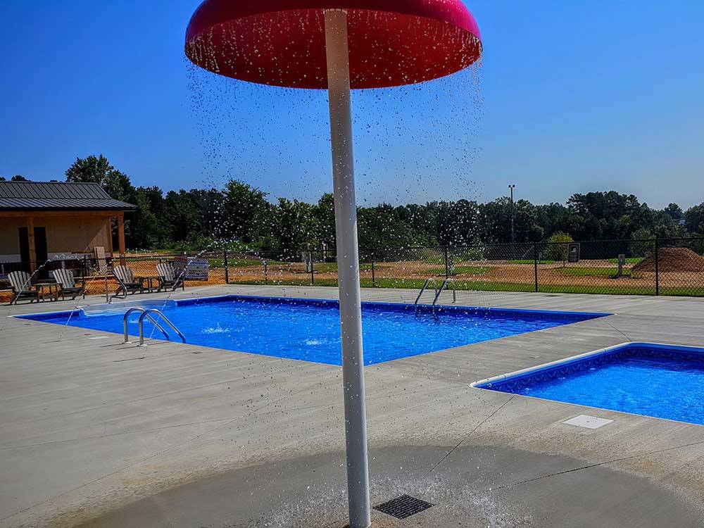Swimming pool at campground at THE COVE LAKESIDE RV RESORT AND CAMPGROUND
