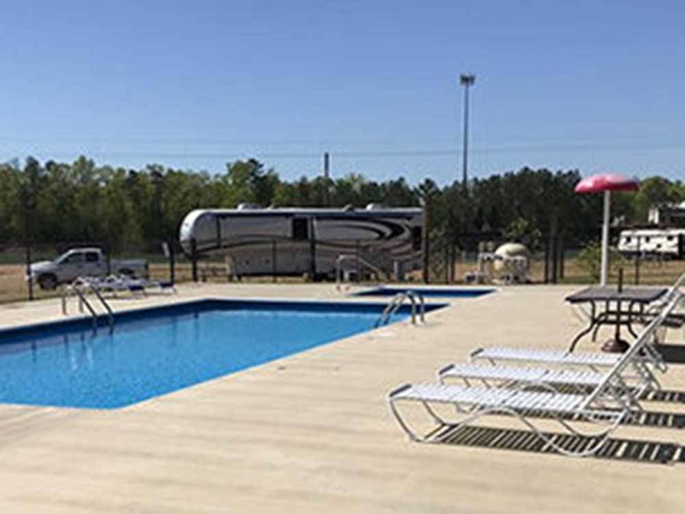 The swimming pool area at THE COVE LAKESIDE RV RESORT AND CAMPGROUND