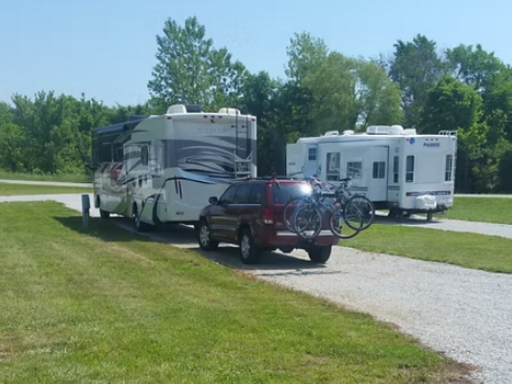 Travel trailers in gravel sites at Camp Mi Casa on the Route RV Park