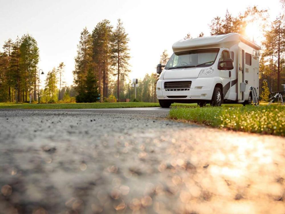 View of a motorhome from ground level at Bedford Creek Campground & Marina