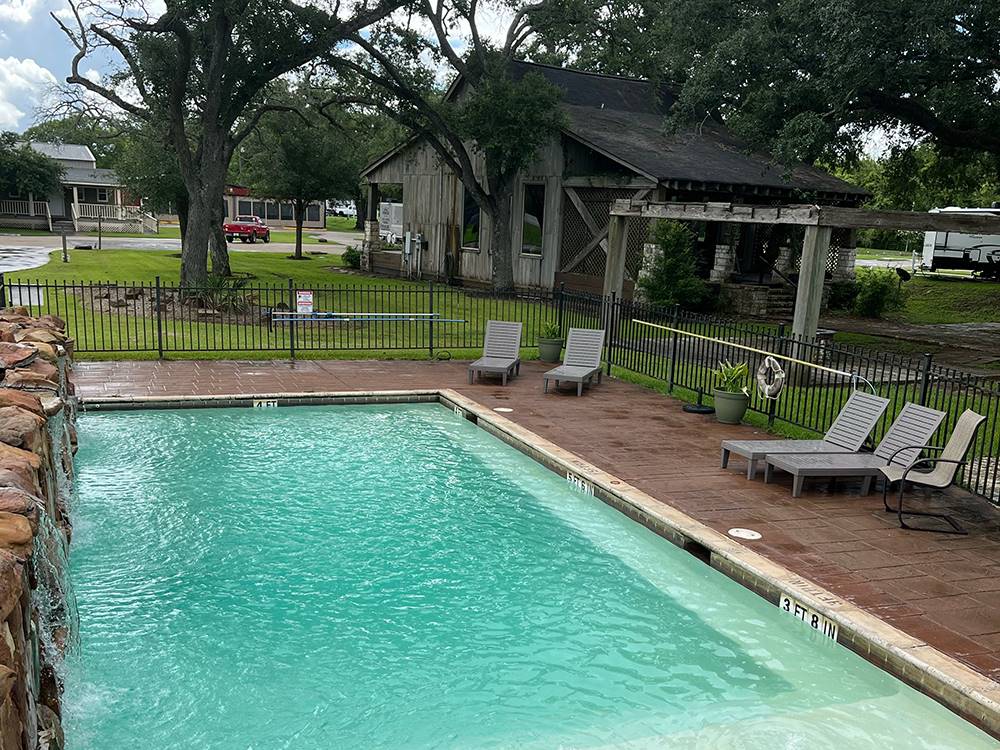 The pool area with seating at Stonebridge RV Park & Resort