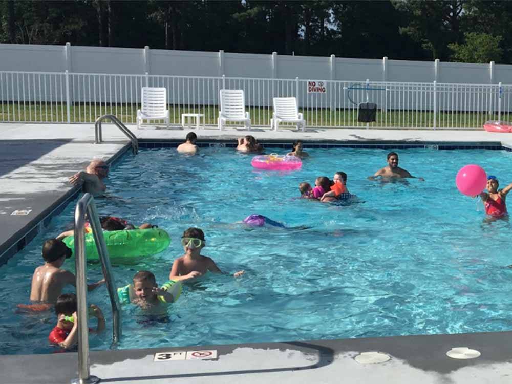 Kids playing in the swimming pool at DEEP CREEK RV RESORT & CAMPGROUND