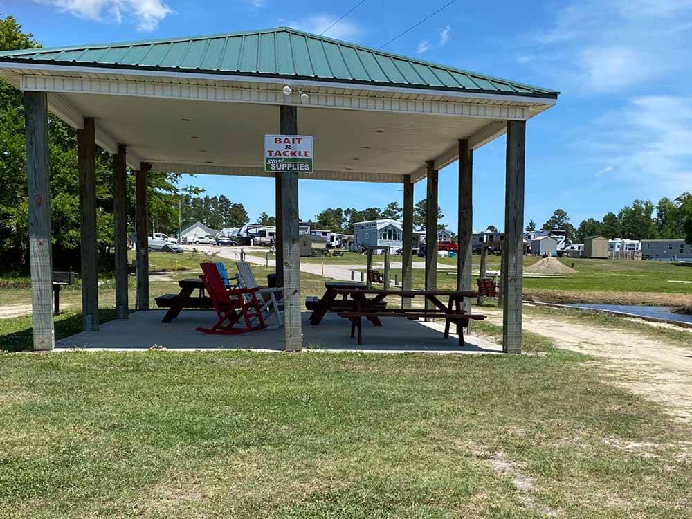 Benches under the pavilion at DEEP CREEK RV RESORT & CAMPGROUND