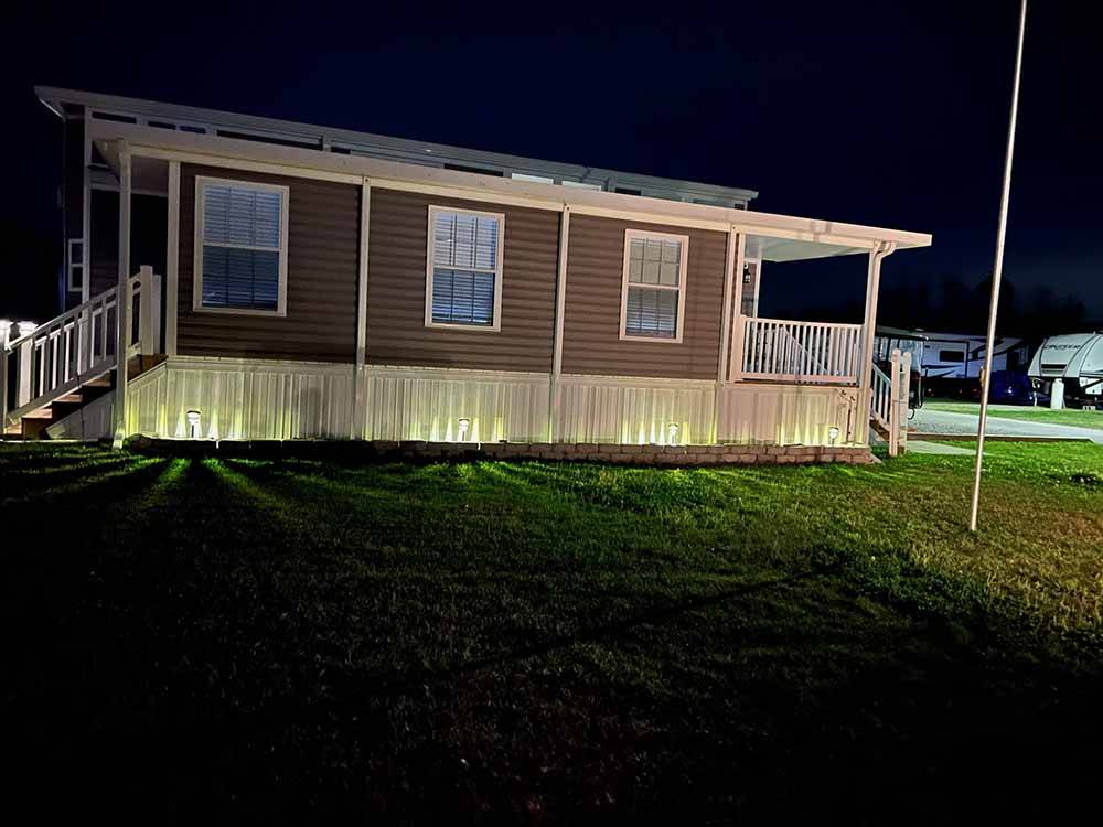 One of the cabin rentals lit up at DEEP CREEK RV RESORT & CAMPGROUND
