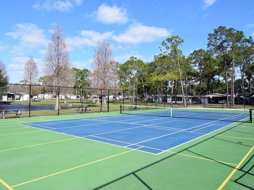 The tennis and pickleball courts at CAMP INN RV RESORT