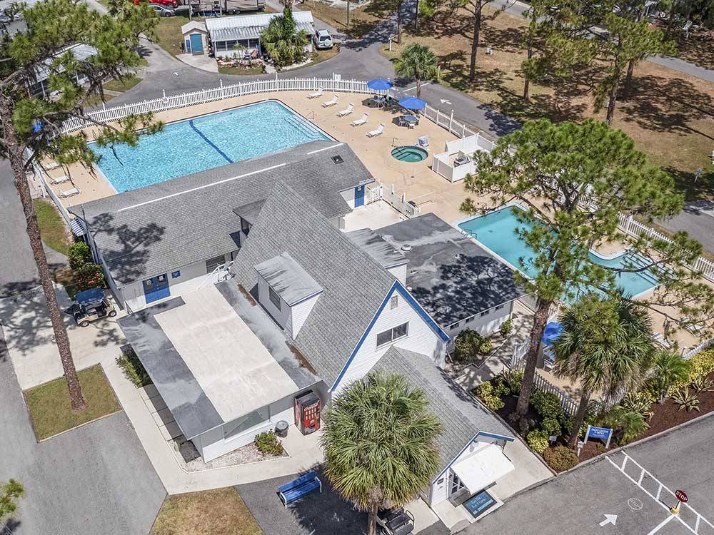 Aerial view of office and swimming pools at CAMP INN RV RESORT