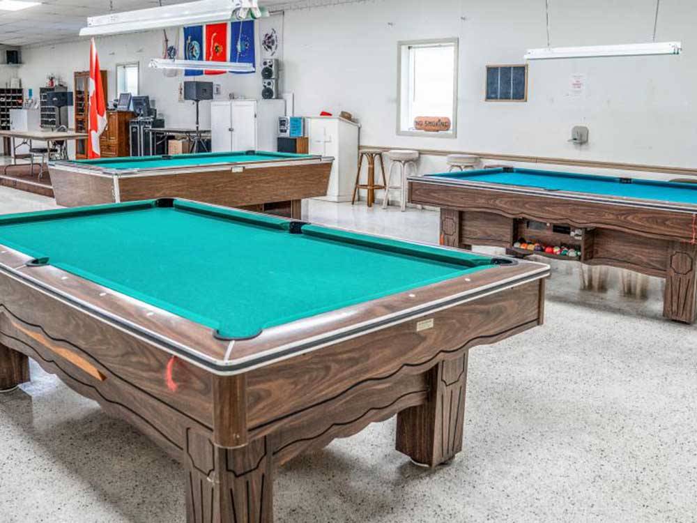 Pool tables in the lounge at WINTER PARADISE RV RESORT