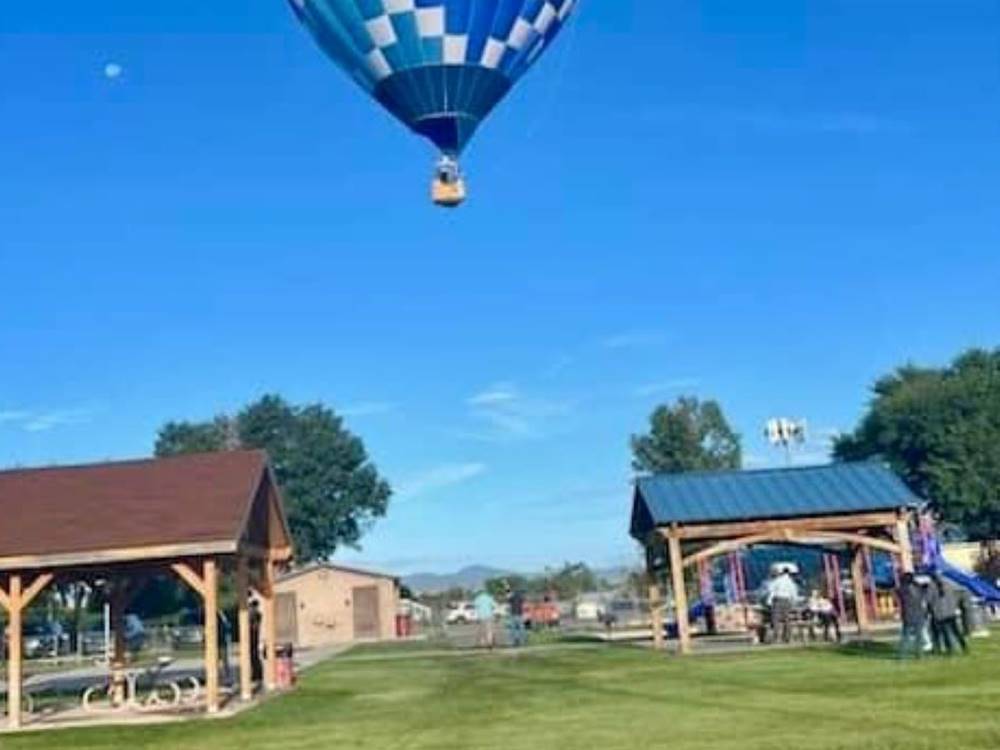 Hot air balloon floating over the park at Springerville RV Park