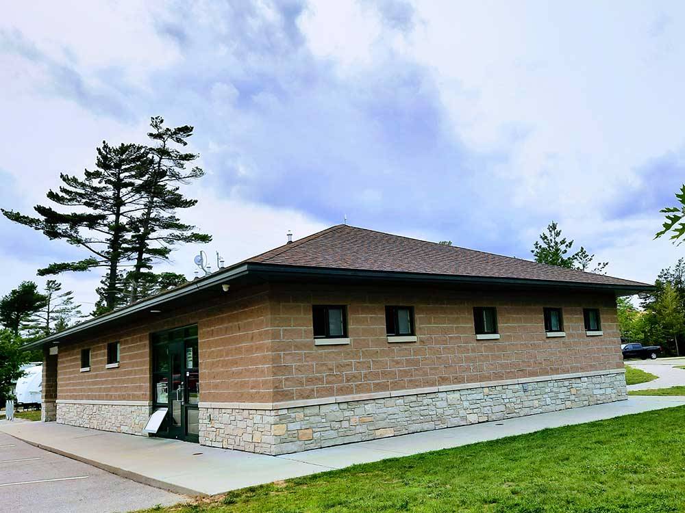 The front of the office building at MANISTIQUE LAKESHORE CAMPGROUND