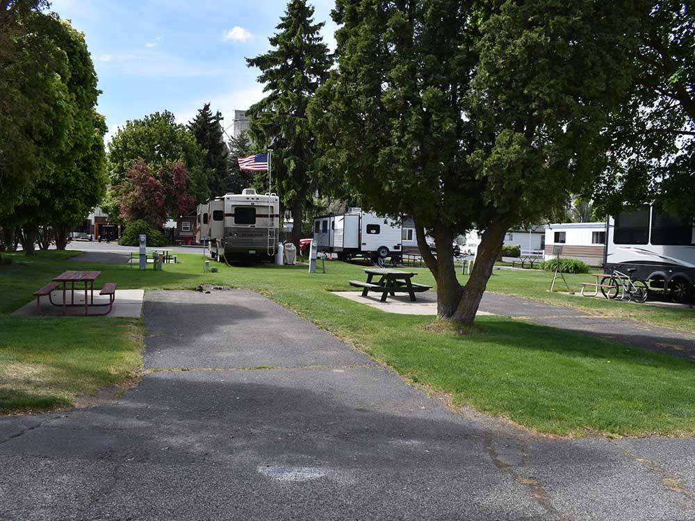 A back in paved RV site at GOOSE CREEK RV PARK & CAMPGROUND