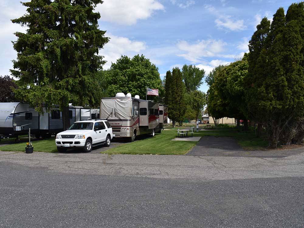 A trailer in a RV site at GOOSE CREEK RV PARK & CAMPGROUND