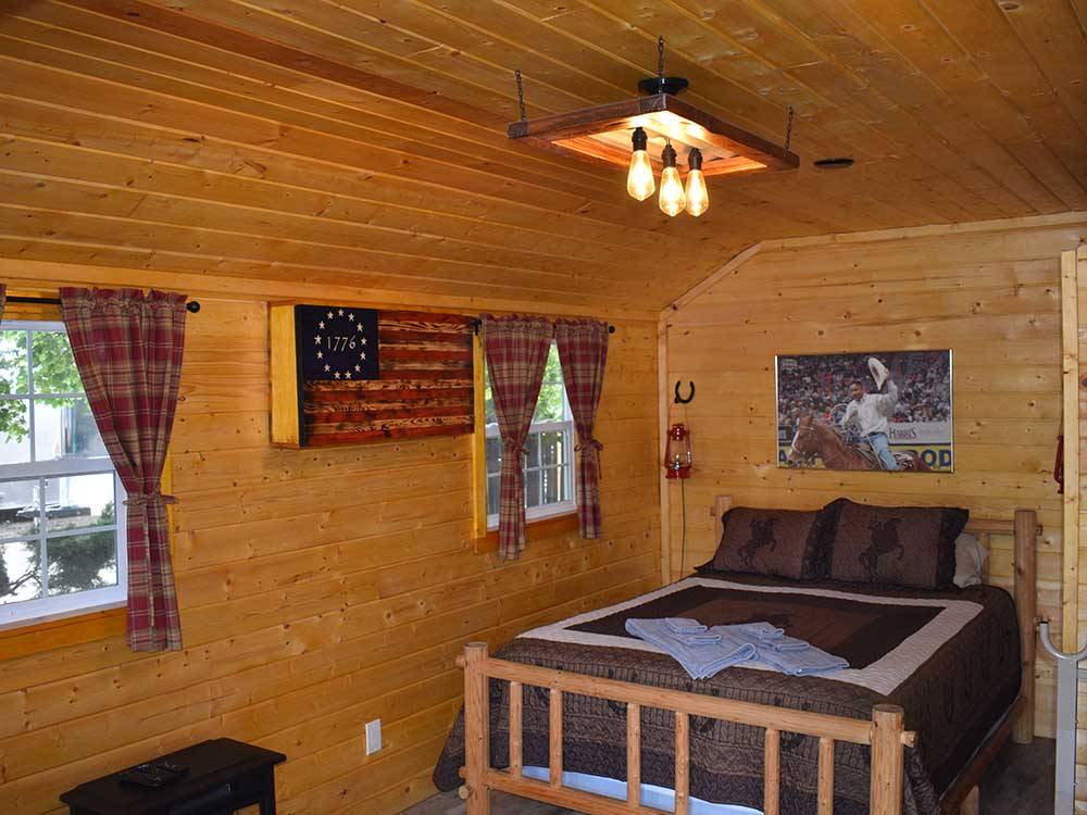 The bedroom in the rental cabin at GOOSE CREEK RV PARK & CAMPGROUND