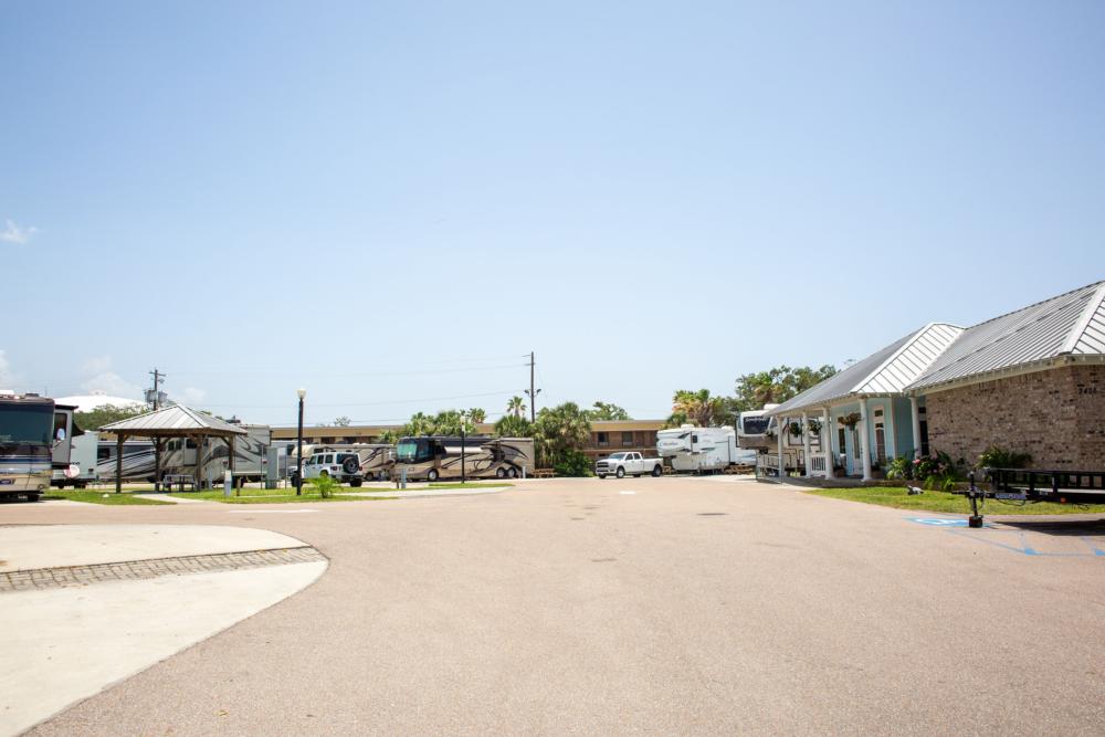 Parked RV's and trailers at site Gulf Beach RV Resort