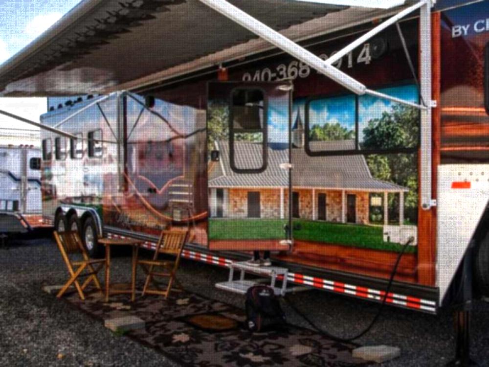 RV parked with seating area at Hipico Santa Fe