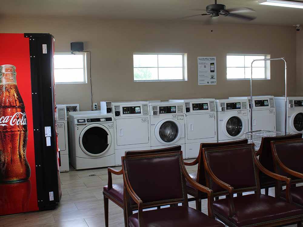 The laundry room and Coke machine at BAYOU BEND RV RESORT