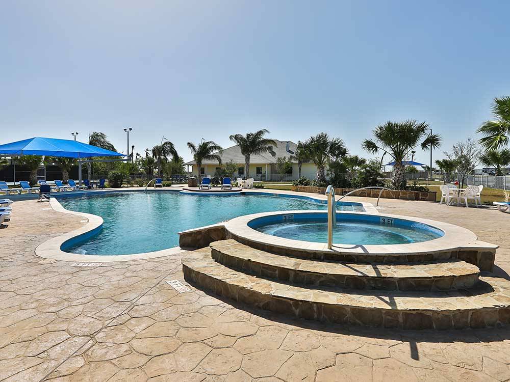 The hot tub and swimming pool at JETSTREAM RV RESORT - TROPICAL TRAILS