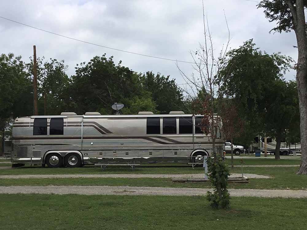 A bus conversion in an RV site at OAKDALE PARK