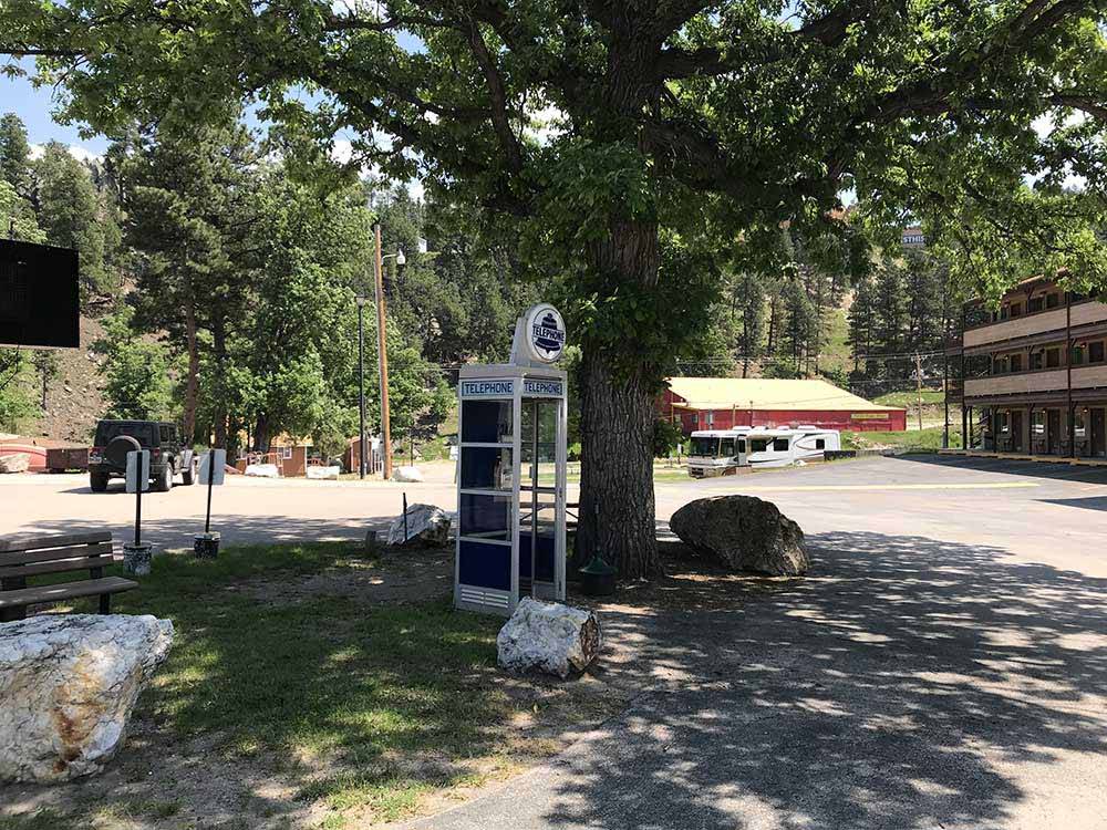 Phone booth and RV at RUSHMORE VIEW RV PARK
