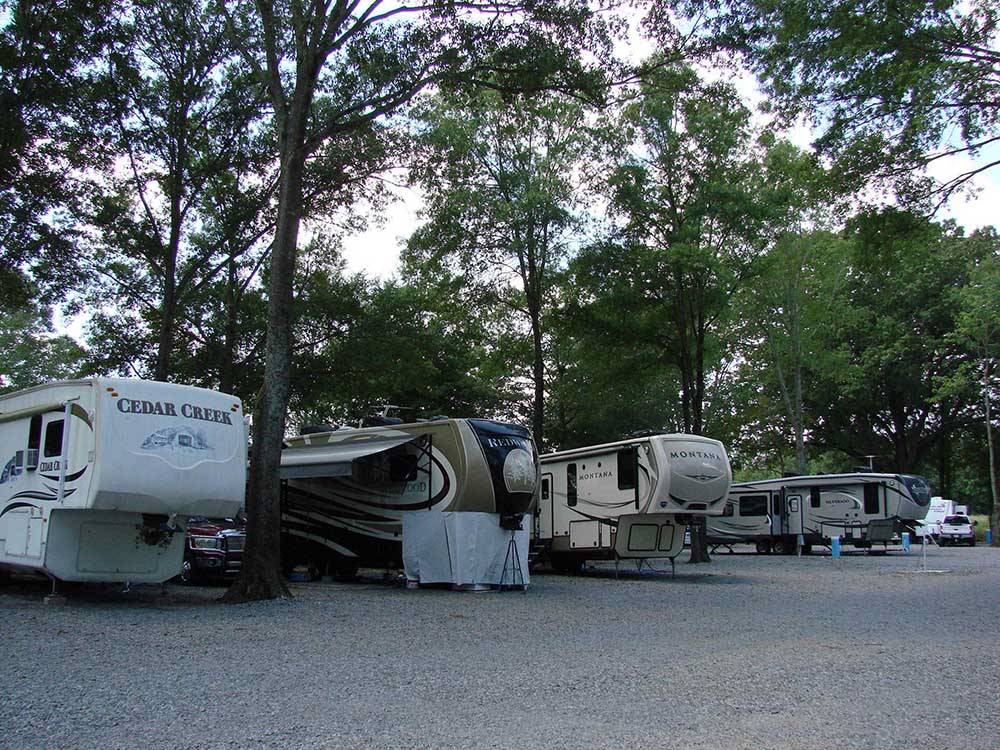 Towable RVs parked on-site at RED RIVER RV PARK
