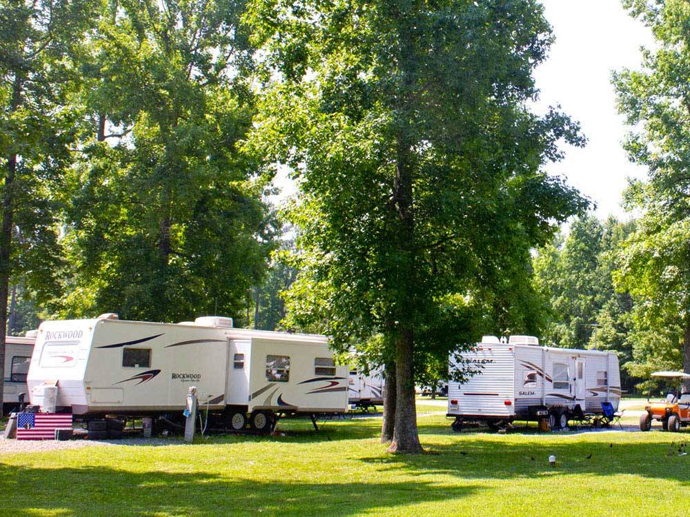 Trailers camping at campsite at THOUSAND TRAILS CHESAPEAKE BAY