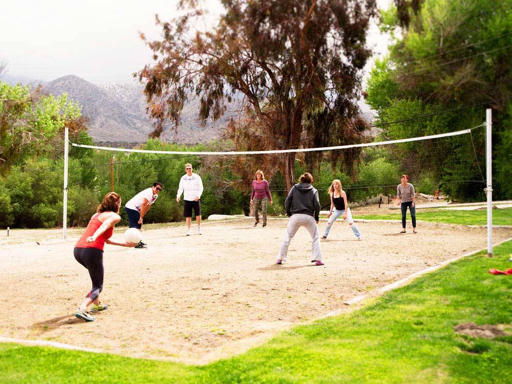 Campers playing volleyball at THOUSAND TRAILS SOLEDAD CANYON