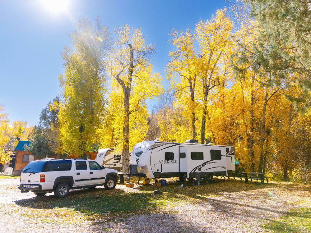 SUV and trailer at site