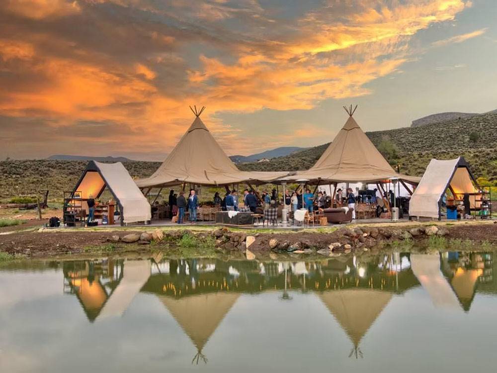 People under the tent enjoying music