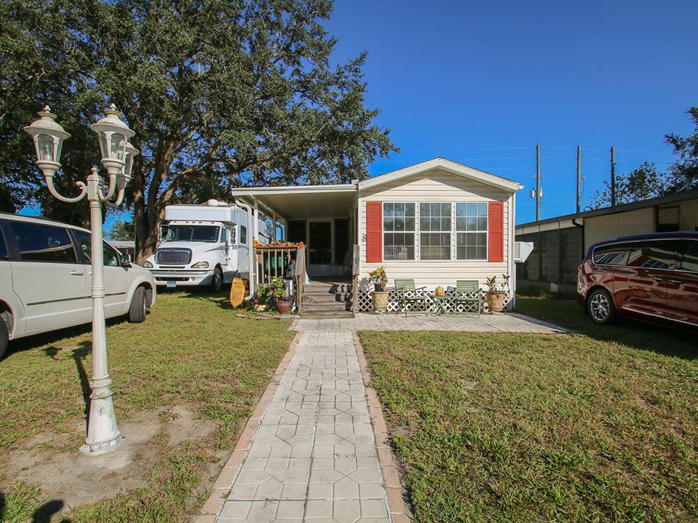 One of the sites with paved pathway at The Oaks at Zephyrhills
