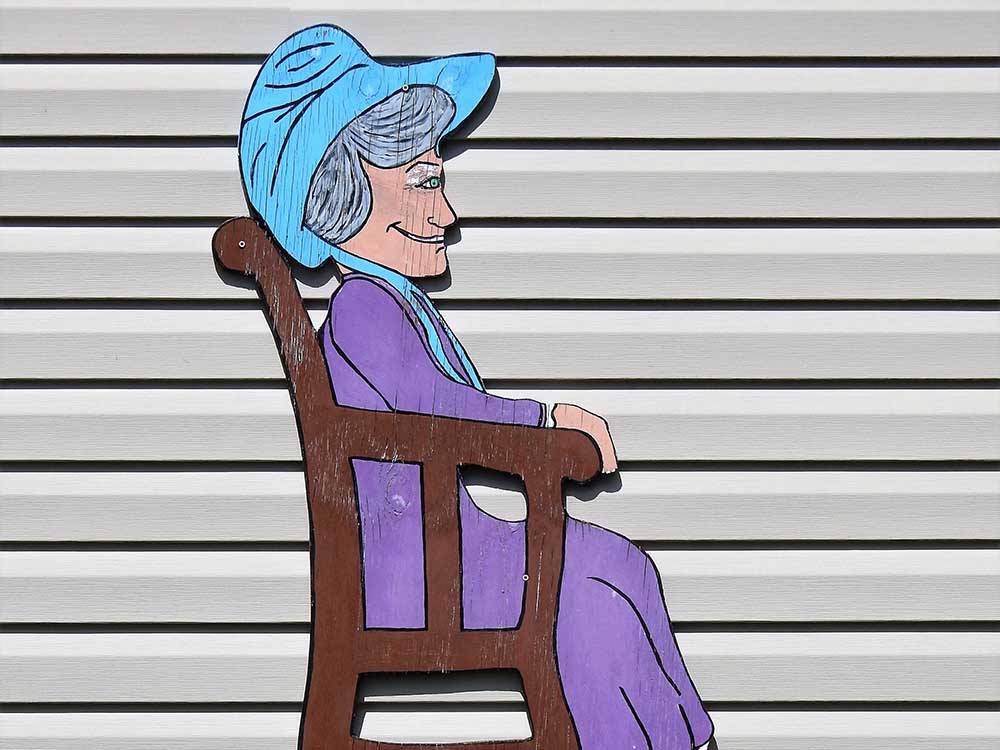 A cut out of an older woman in a chair at GRANDMA'S GROVE RV PARK