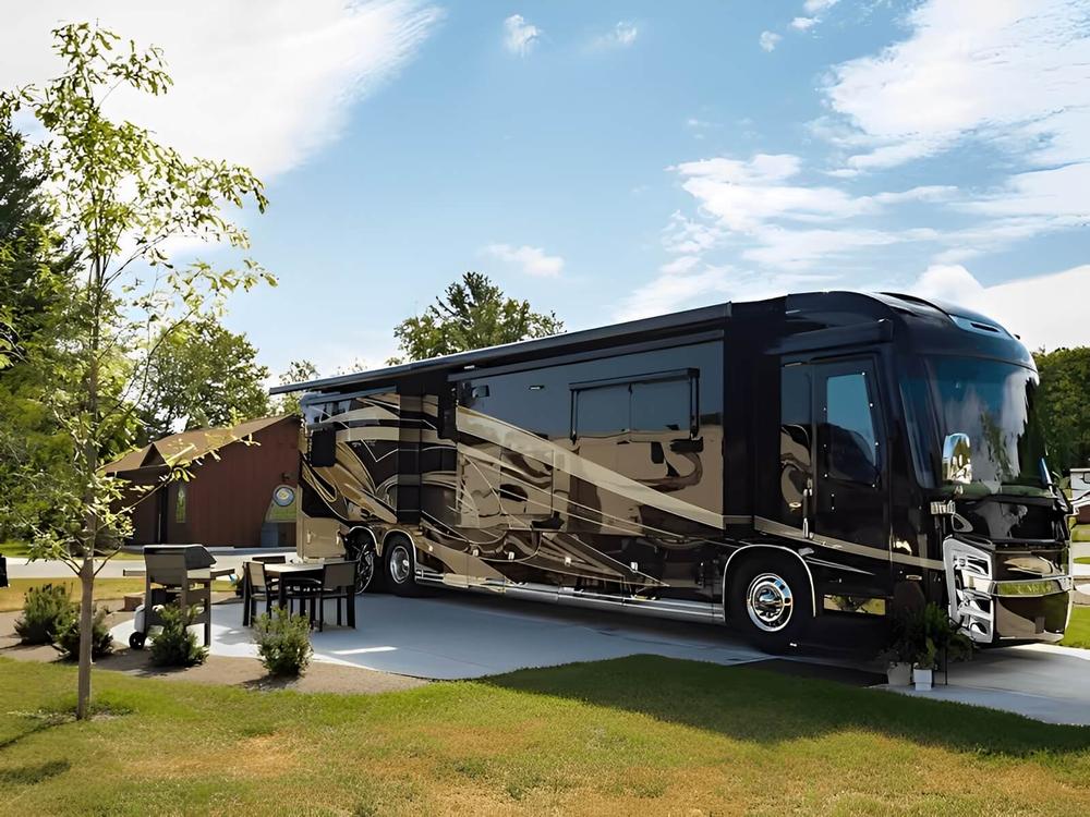 A motorhome in a paved site at