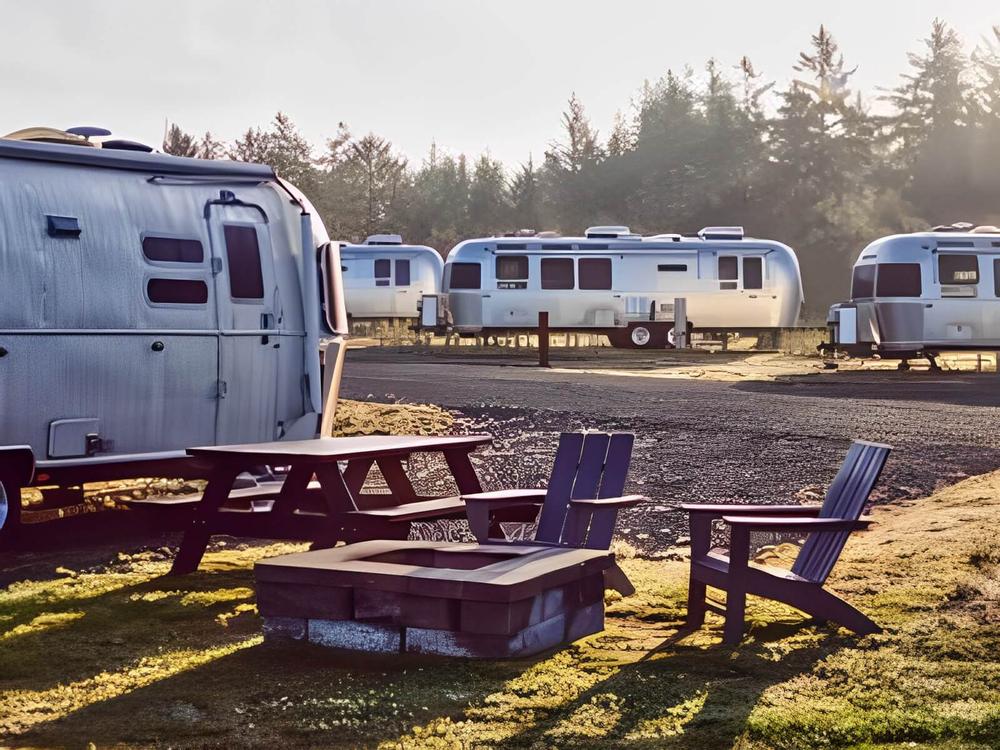 Several Airstream trailers parked in sites