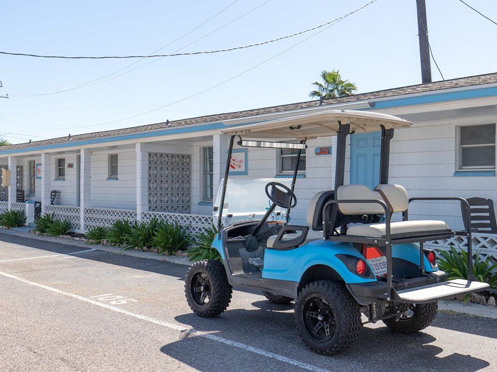 Golf cart in front of rentals at TROPIC ISLAND RESORT