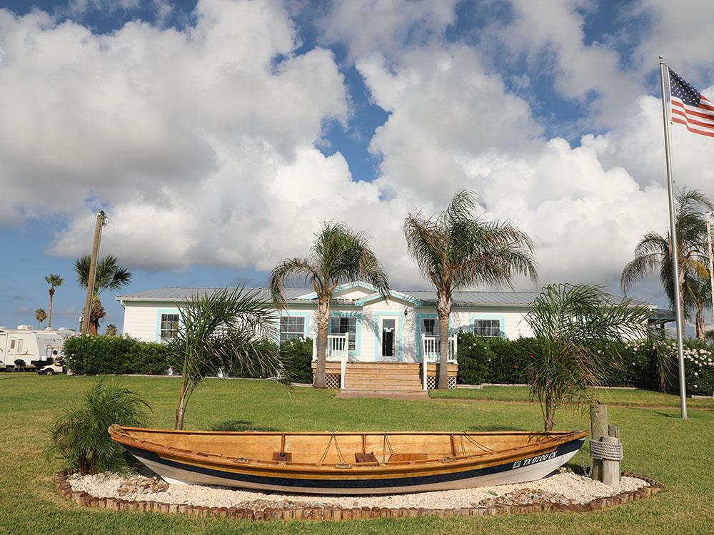 Grassy area in front of a rental at TROPIC ISLAND RESORT