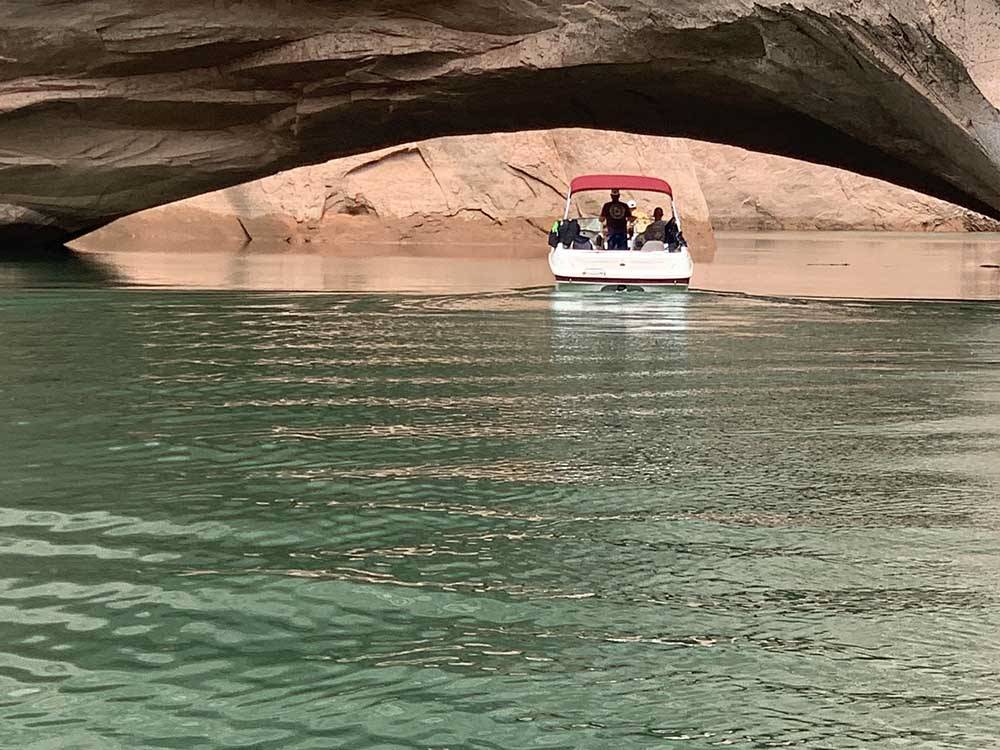 A couple of guys in a boat at Lake Powell nearby at FREMONT RIVER RV PARK
