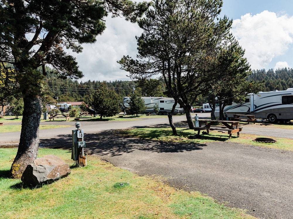 Couple riding bicycles at HART'S CAMP AIRSTREAM MOTEL & RV PARK