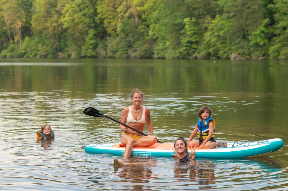 People on a standup paddle board