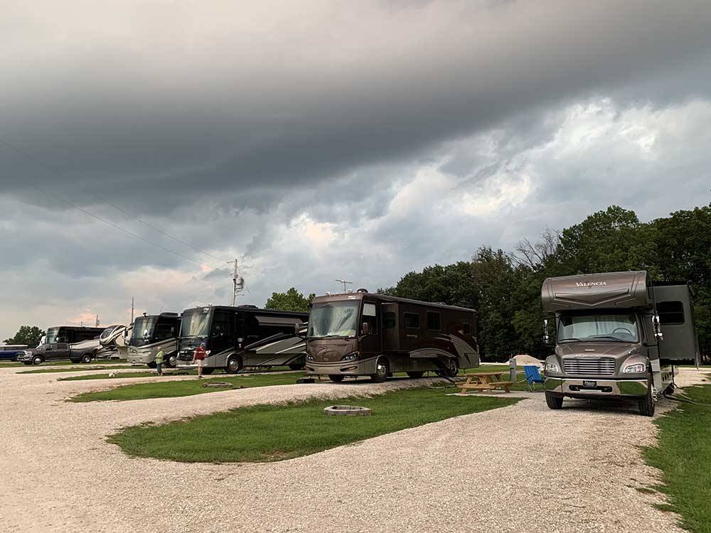 Motorhomes in campsites at CEDAR CREEK RESORT & RV PARK
