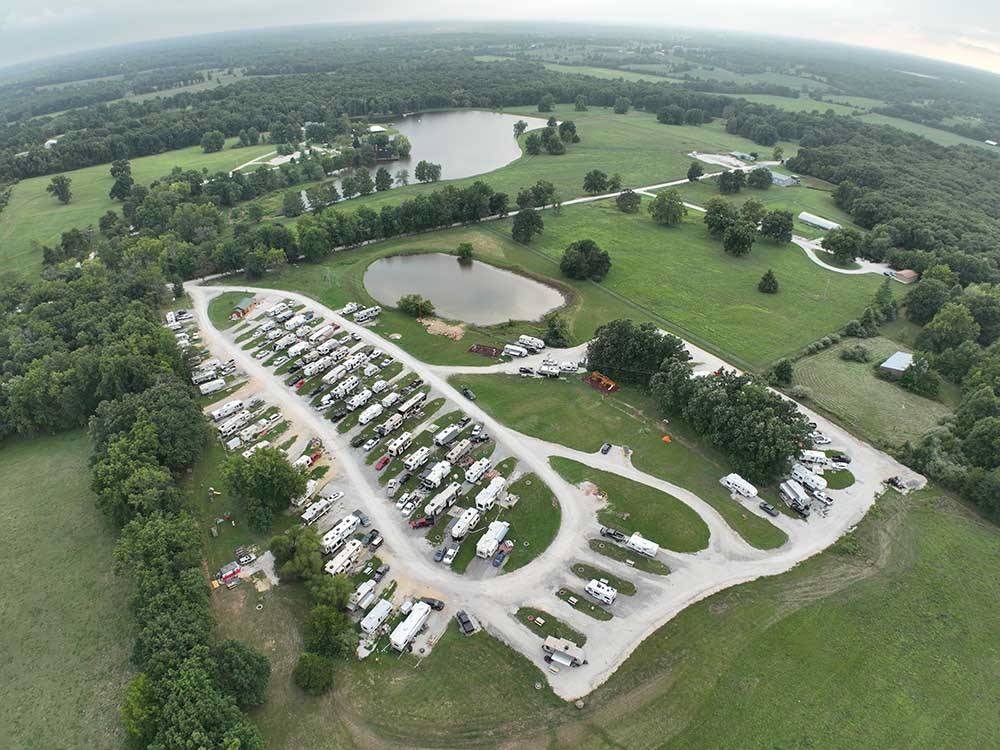 Aerial view of motorhome sin campsites at CEDAR CREEK RESORT & RV PARK
