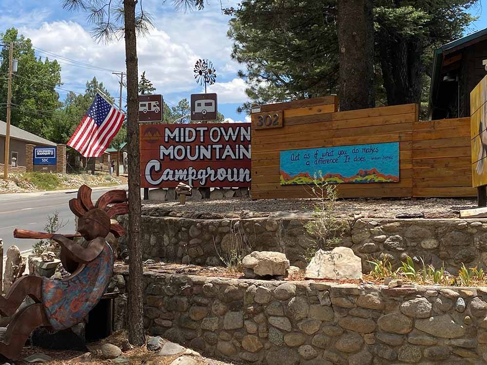 The front entrance sign at MIDTOWN MOUNTAIN CAMPGROUND  RV PARK