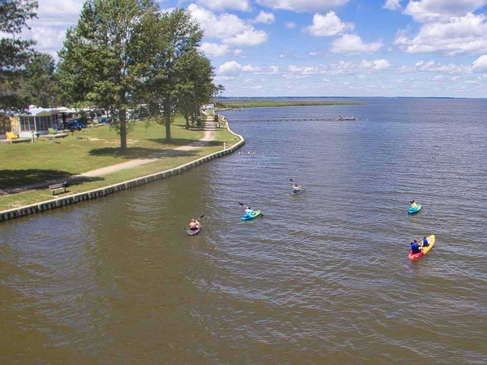 A group of campers in kayaks at OUTER BANKS WEST/CURRITUCK SOUND KOA HOLIDAY