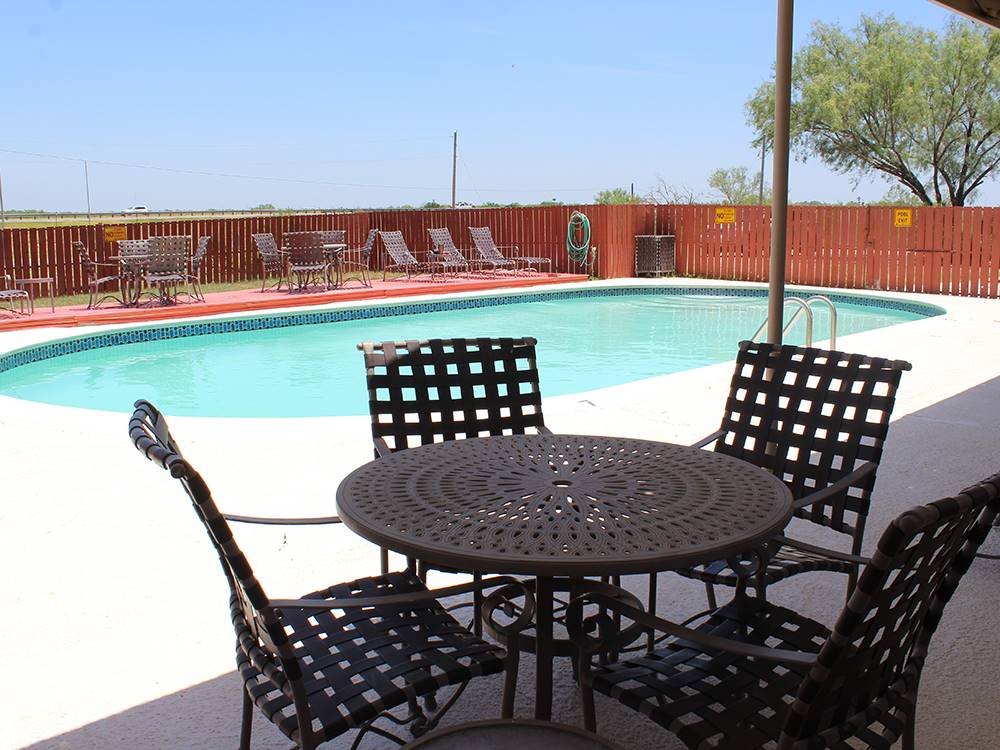 Sitting area at the pool at Cotulla Camp Resort