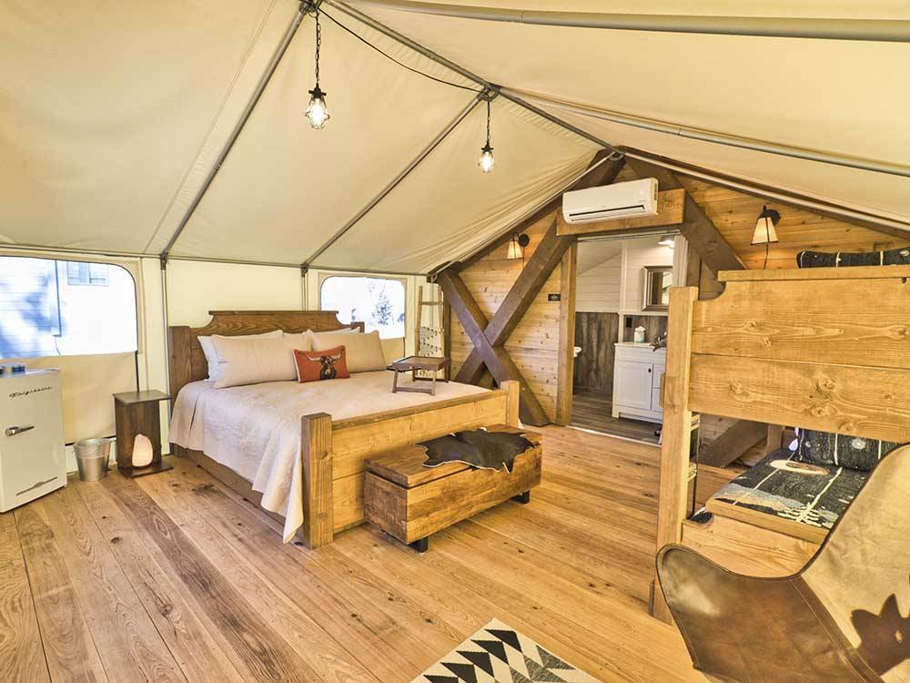 The beds inside of the glamping tent at VERDE RANCH RV RESORT