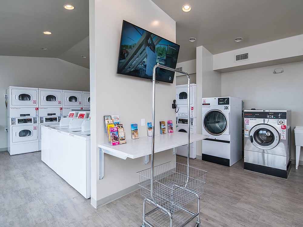 Inside of the clean & modern laundry room at VERDE RANCH RV RESORT